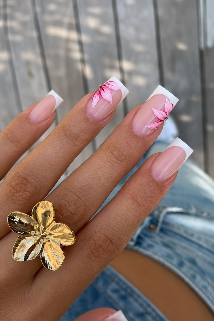 White French tips with hand-painted pink flower art